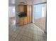 View of kitchen, microwave, and connecting room at 926 Perry St, Denver, CO 80204