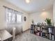 Home office with desk, chair, and bookcase at 516 Tanager St, Brighton, CO 80601