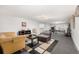 Finished basement with sitting area and home gym at 4980 E Donald Ave # 14, Denver, CO 80222