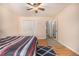 Bright bedroom with double closet and ceiling fan at 4980 E Donald Ave # 14, Denver, CO 80222