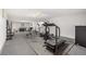 Basement gym with treadmill, elliptical, and weights at 4980 E Donald Ave # 14, Denver, CO 80222