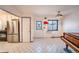 Bright living area with tile flooring, modern appliances, and natural light at 2205 S King St, Denver, CO 80219