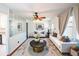 Modern living room featuring hardwood floors, plush seating, and stylish decor at 2205 S King St, Denver, CO 80219