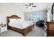 Relax in this inviting bedroom with a large window offering natural light and scenic views at 737 Novick Ct, Castle Rock, CO 80109