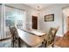 Elegant dining room with hardwood floors, ample natural light, and modern accents at 737 Novick Ct, Castle Rock, CO 80109