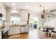 Bright kitchen featuring stainless steel appliances, a breakfast nook, and a view to the outdoor deck at 737 Novick Ct, Castle Rock, CO 80109