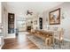 Bright and airy living room featuring hardwood floors, fireplace, and stylish decor at 737 Novick Ct, Castle Rock, CO 80109