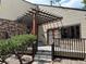 Charming home exterior featuring a pergola covered entrance and stone detailing at 539 Wright St # 203, Lakewood, CO 80228