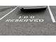 Assigned parking space for residence labeled 100 and reserved at 539 Wright St # 203, Lakewood, CO 80228
