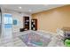 Finished basement offering versatile space with painted walls, wood-look floors, and ample lighting at 7245 Prairie Cir, Longmont, CO 80504