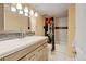 Bright bathroom featuring modern vanity with stylish sink and fixtures at 7245 Prairie Cir, Longmont, CO 80504