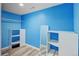 Closet with built-in shelves and a full-length mirror, offering ample storage and functionality at 7245 Prairie Cir, Longmont, CO 80504