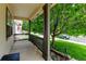 Inviting covered front porch with sturdy posts and decorative railing, perfect for relaxing outdoors at 7245 Prairie Cir, Longmont, CO 80504