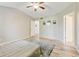 Main bedroom features an ensuite bath, two closets, and durable wood-style laminate flooring at 7245 Prairie Cir, Longmont, CO 80504