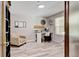 Cozy home office featuring neutral walls, natural light, and comfortable chair with a workspace at 7245 Prairie Cir, Longmont, CO 80504