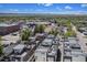 Aerial view highlighting the neighborhood layout, nearby amenities, and the home's advantageous location at 5610 S Sycamore St, Littleton, CO 80120