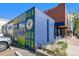 Exterior view of local business front, featuring unique street art and inviting storefront at 5610 S Sycamore St, Littleton, CO 80120