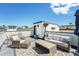 Relaxing rooftop deck with stylish outdoor furniture, perfect for entertaining and enjoying sunny days at 5610 S Sycamore St, Littleton, CO 80120