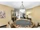 This game room features a card table, decorative screen, and modern lighting at 1020 15Th St # 42C, Denver, CO 80202