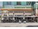 The Cheesecake Factory offers outdoor dining with umbrellas for shade at 1020 15Th St # 42C, Denver, CO 80202