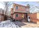 Brick home with patio and access to backyard at 626 Fillmore St, Denver, CO 80206