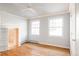 Bright bedroom with hardwood floors and built-in shelving at 626 Fillmore St, Denver, CO 80206