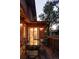 Deck with dining table and view into kitchen at 626 Fillmore St, Denver, CO 80206