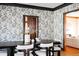 Modern dining room with dark wood table and stylish chairs at 626 Fillmore St, Denver, CO 80206