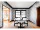 Elegant dining room with statement wallpaper and modern table at 626 Fillmore St, Denver, CO 80206