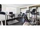 Basement home gym, with exercise equipment and a workspace at 626 Fillmore St, Denver, CO 80206