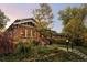 Brick craftsman home with landscaped yard at 626 Fillmore St, Denver, CO 80206