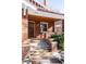 Front porch with brick steps and wooden door at 626 Fillmore St, Denver, CO 80206