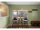 Eat-in kitchen area features a breakfast nook with amazing views, and easy access to the living area at 8701 Majestic View Dr, Conifer, CO 80433