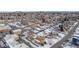 An aerial view of a house with a city skyline in the background at 3780 Benton St, Wheat Ridge, CO 80212