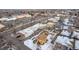 Aerial view of a house near a shopping center and other buildings at 3780 Benton St, Wheat Ridge, CO 80212