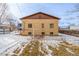 Back of the house showcasing brick exterior and a small yard at 3780 Benton St, Wheat Ridge, CO 80212