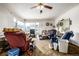 Living room with hardwood floors and various furniture at 3780 Benton St, Wheat Ridge, CO 80212