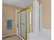 Bathroom with a shower and gold-framed glass enclosure at 317 Ingleton Ct, Castle Pines, CO 80108