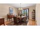 Formal dining room with hardwood floors and a chandelier at 317 Ingleton Ct, Castle Pines, CO 80108