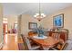 Formal dining room featuring a wood table and sideboard at 317 Ingleton Ct, Castle Pines, CO 80108