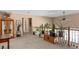 Spacious loft area with multiple plants and a ceiling fan at 317 Ingleton Ct, Castle Pines, CO 80108