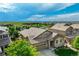 A scenic aerial view captures the roof and landscape, showcasing the home's serene surroundings at 14116 Double Dutch Cir, Parker, CO 80134