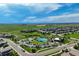 Capture a neighborhood with a central community pool, surrounded by homes and greenery at 14116 Double Dutch Cir, Parker, CO 80134