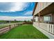 A spacious lawn and covered patio offer seamless indoor-outdoor living at 14116 Double Dutch Cir, Parker, CO 80134