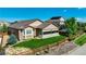 Aerial view of a backyard with a covered patio and well-maintained landscaping at 14116 Double Dutch Cir, Parker, CO 80134