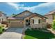 Charming single-Gathering home with a well-manicured lawn, stone accents, and a two-car attached garage at 14116 Double Dutch Cir, Parker, CO 80134