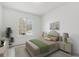 Bright bedroom featuring a large window, neutral decor, and a comfortable bed with green accents at 9057 Bermuda Run Cir, Highlands Ranch, CO 80130