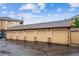 Row of garages for resident parking, with well maintained surroundings at 8520 S Holland Ln # 102, Littleton, CO 80128