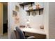 Bright office nook with floating shelves, and space for focused work at 8520 S Holland Ln # 102, Littleton, CO 80128