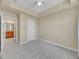 Bedroom with carpet, access to bathroom, and ample closet space at 2200 S University Blvd # 511, Denver, CO 80210